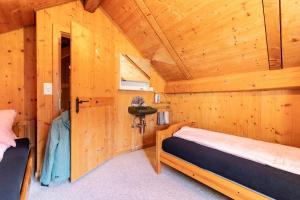 Cama o camas de una habitación en Chasa Muglin Ardez
