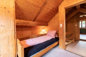 Cama o camas de una habitación en Chasa Muglin Ardez