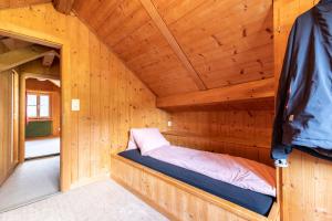 Cama o camas de una habitación en Chasa Muglin Ardez