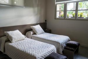 Posteľ alebo postele v izbe v ubytovaní Villa-Mari
