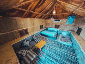 Postel nebo postele na pokoji v ubytování New Moon Island Camp + 37 fotografií