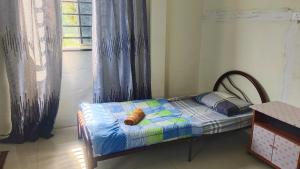 Giường trong phòng chung tại Steffan Family Stay