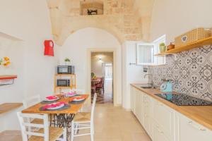 Kuchyň nebo kuchyňský kout v ubytování La Storica, casa tipica.