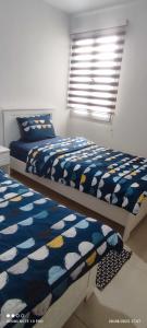Säng eller sängar i ett rum på Adan beach