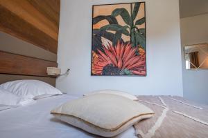 Cama ou camas em um quarto em Hôtel & Restaurant Les Mouettes
