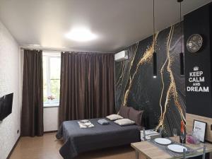 Ένα ή περισσότερα κρεβάτια σε δωμάτιο στο Academic st. Apartment