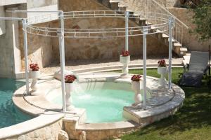 Bazén v ubytování Hotel Saturno Fonte Pura nebo v jeho okolí