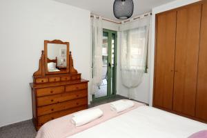 Posteľ alebo postele v izbe v ubytovaní Apartamento dos habitaciones primera línea de playa