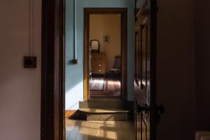 Postel nebo postele na pokoji v ubytování Tullymurry House