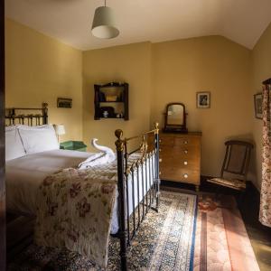 Postel nebo postele na pokoji v ubytování Tullymurry House