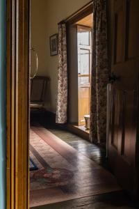 Postel nebo postele na pokoji v ubytování Tullymurry House