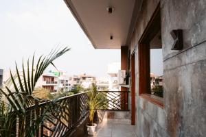 Balkón nebo terasa v ubytování FlxHo Duo - Serviced Apartment & Rooms - Golf Course Road