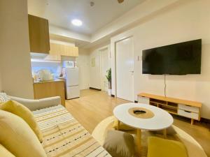 Μια τηλεόραση ή/και κέντρο ψυχαγωγίας στο 17Eleven Staycation Home