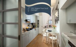 Kuhinja oz. manjša kuhinja v nastanitvi Daplace - Renzo Apartment