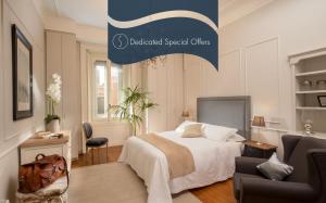 A bed or beds in a room at Daplace - Renzo Apartment