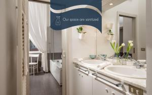 A bathroom at Daplace - Renzo Apartment