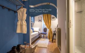 A bed or beds in a room at Daplace - Renzo Apartment
