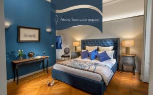 A bed or beds in a room at Daplace - Renzo Apartment