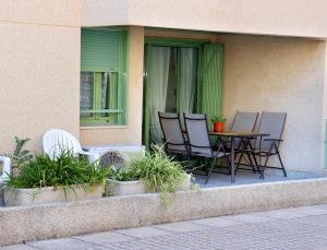 Patio alebo iná vonkajšia časť ubytovania Apartamento dos habitaciones primera línea de playa