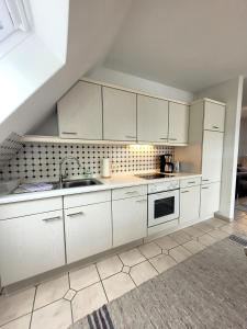 Kuchyň nebo kuchyňský kout v ubytování Winterberg Appartement 21103