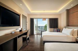 Sjónvarps- og/eða afþreyingartæki á DoubleTree by Hilton Damai Laut
