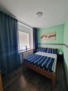 Postel nebo postele na pokoji v ubytování Alteschule15