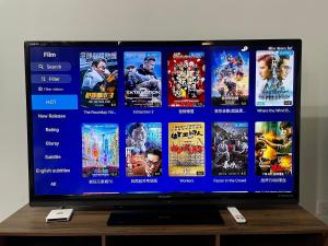 a flat screen tv sitting on top of a table at Top Sea View - Maritime Suite 只有海景房 in Jelutong +49 photos