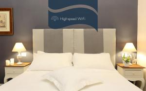 Letto o letti in una camera di Daplace - Arena House