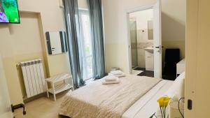 Postel nebo postele na pokoji v ubytování Bonaini Relax B&B