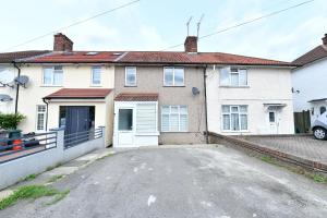 an empty street in front of a house at North West London Escape in Mill Hill