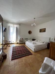Postel nebo postele na pokoji v ubytování A un passo dal castello