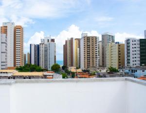 a view of a city skyline with tall buildings at Hotel Mares de Iracema in Fortaleza