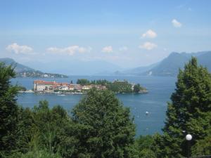 a large body of water with mountains at Villa Maria in Stresa