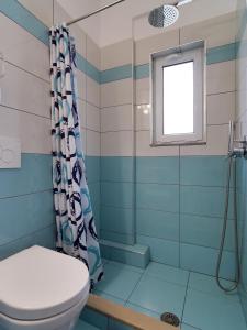 Koupelna v ubytování Himara Royal Hotel