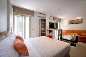 TV a/nebo společenská místnost v ubytování Hotel Colorado