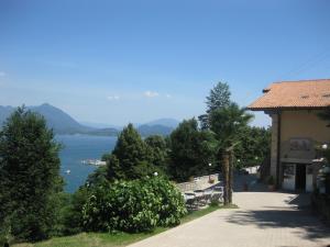 a view from a balcony overlooking the ocean at Villa Maria in Stresa