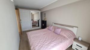 Postel nebo postele na pokoji v ubytování Riella Home + 4 fotografie