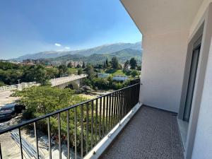 a balcony with a view of the mountains at Hotel Trifoni in Përmet