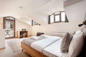 Postel nebo postele na pokoji v ubytování Whisper Flats by Oval
