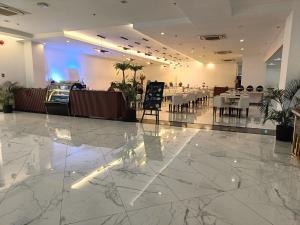 Restaurace v ubytování Golden Peak Hotel & Suites powered by Cocotel