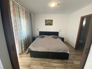 Postel nebo postele na pokoji v ubytování Residenz Zikeli