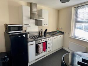 Dapur atau dapur kecil di Silver Stag Properties, Comfy 2 BR Home in Ashby