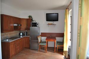 Kuchyňa alebo kuchynka v ubytovaní Horské apartmány Jeseníky