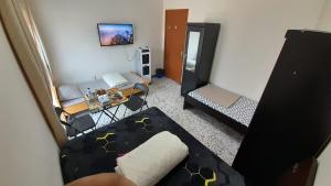 TV a/nebo společenská místnost v ubytování ADMF#101-R1