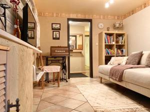a bedroom with a bed and a piano in a room at Ferienwohnung Crawissimo in Crawinkel