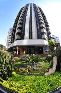 a large building with a dome on top of it at Flat Fortune Jardins in Sao Paulo