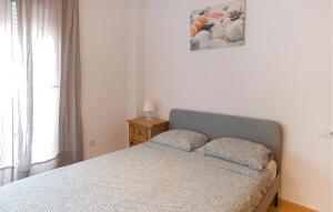 Ένα ή περισσότερα κρεβάτια σε δωμάτιο στο Stunning Apartment In Balsicas With Outdoor Swimming Pool