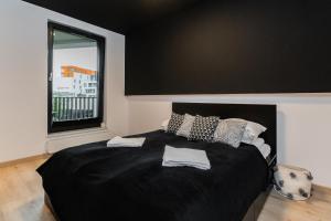 Posteľ alebo postele v izbe v ubytovaní Grand Apartments - Portova Luxury Apartments