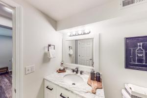 Koupelna v ubytování Woodin-villa + 7 fotografií