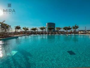 Bazén v ubytování Mira Holiday Homes - Serviced 1 bedroom in Dubai Hills nebo v jeho okolí